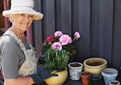 Woman potting plants